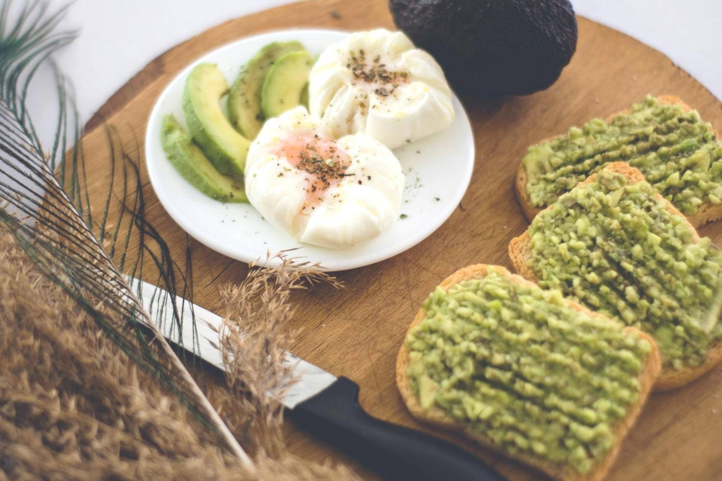 Fresh vegetables and ingredients being prepared in kitchen workspace