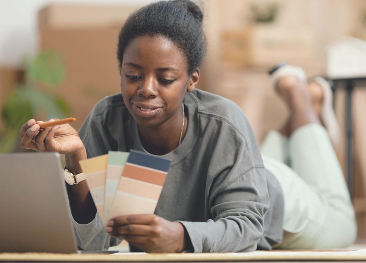 Collaborative cooking workshop showing hands preparing fresh vegetables on wooden cutting boards